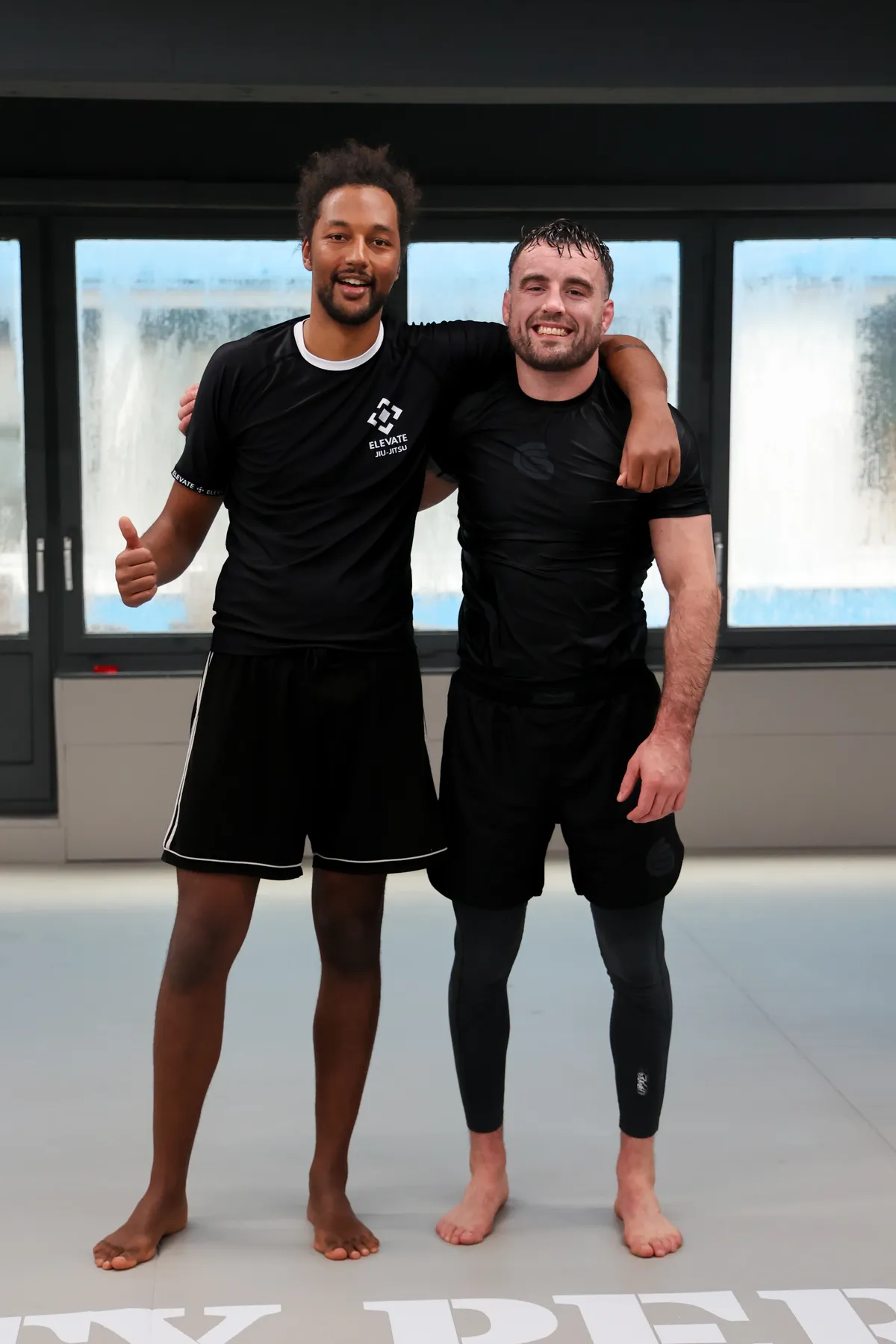 BJJ-Coach Belami Osinski mit weiterem Trainer bei Elevate München